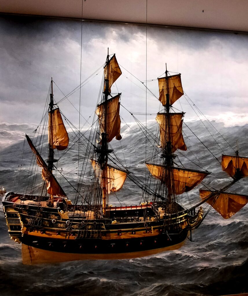 Detailed model of a historic sailing ship displayed at the International Maritime Museum in Hamburg.