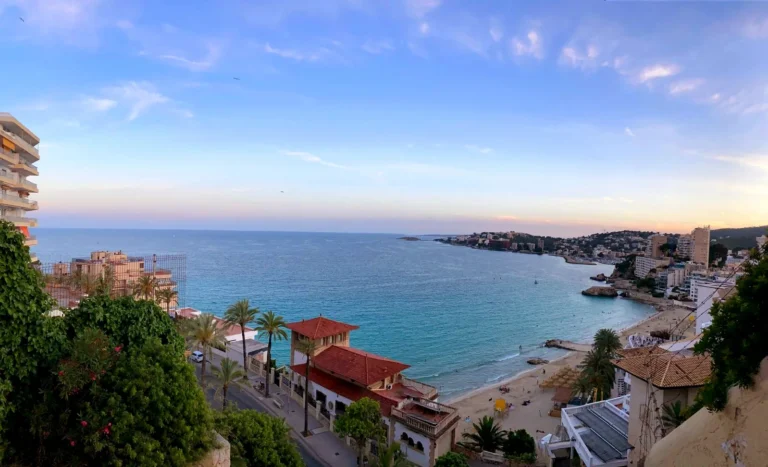 Panoramic view of Cala Major beach and the Mediterranean Sea in Mallorca at sunset