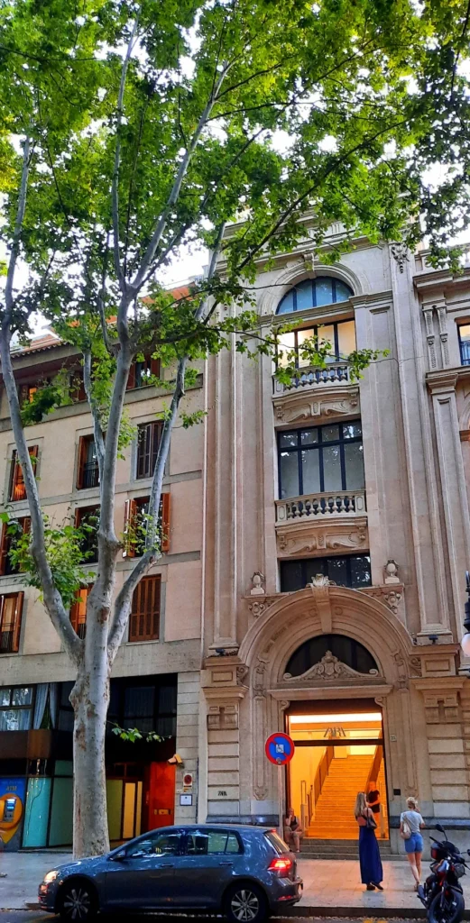 Ornate historic building façade with a Zara store entrance in Palma, Mallorca